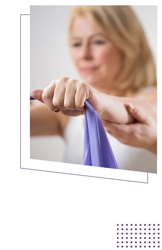 Physical Therapy Colorado Springs CO Person Doing Physical Therapy Stretches HP Person Doing Physical Therapy Stretches With A Purple Resistance Band