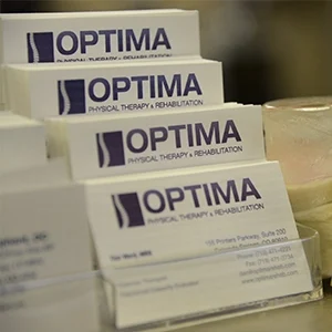 Stack Of Business Cards For Optima Physical Therapy & Rehabilitation